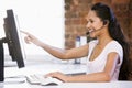 Businesswoman in office wearing headset