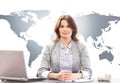 Businesswoman in office on world map background Royalty Free Stock Photo