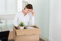 Businesswoman Packing Her Belongings In Box Royalty Free Stock Photo