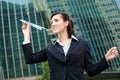 Businesswoman with Paper Plane