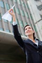 Businesswoman with Paper Plane