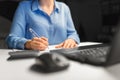 Businesswoman with papers working at night office Royalty Free Stock Photo