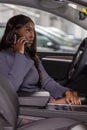 Businesswoman on the Phone in Car