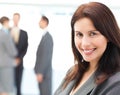 Businesswoman posing in front of her team Royalty Free Stock Photo