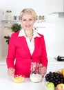 Businesswoman preparing breakfast Royalty Free Stock Photo