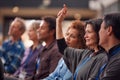 Businesswoman In Presentation At Conference Raising Hand To Ask Question Royalty Free Stock Photo