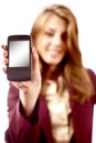 Businesswoman presenting PDA or smartphone Royalty Free Stock Photo