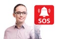 Businesswoman pressing SOS button in case of danger Royalty Free Stock Photo