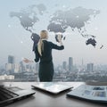 Businesswoman pushing icon on media screen, business globalization Royalty Free Stock Photo