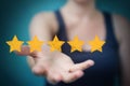 Businesswoman rating with hand drawn stars