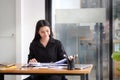 Businesswoman reading document at her workplace Royalty Free Stock Photo