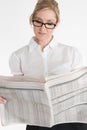 Businesswoman reading financial newspaper Royalty Free Stock Photo