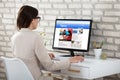 Businesswoman Reading News On Computer Royalty Free Stock Photo