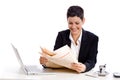 Businesswoman reading newspaper Royalty Free Stock Photo