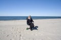 Businesswoman relaxes on beach Royalty Free Stock Photo