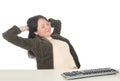 Businesswoman Relaxing at Desk