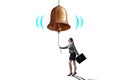 Businesswoman ringing the bell in case of danger