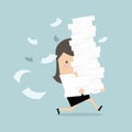 Businesswoman run holding a lot of papers in her hands. Royalty Free Stock Photo