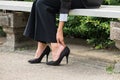 Businesswoman`s Hand Removing High Heels Royalty Free Stock Photo