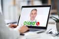 Businessperson Videochatting With Doctor On Laptop Royalty Free Stock Photo
