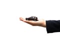 Businesswoman or saleswoman holding miniature car model, auto business, car trading, loans for car concept