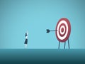 Businesswoman scoring bullseye with dart vector concept. Symbol of success, victory, achievement of goals and objectives