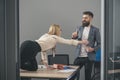 Businesswoman seducing boss man at office table Royalty Free Stock Photo