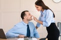 Businesswoman Seducing Male Employee Flirting At Workplace In Modern Office