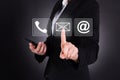 Businesswoman sending message through smart phone Royalty Free Stock Photo