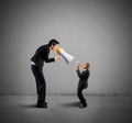 Businesswoman shouting through a megaphone