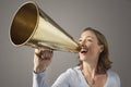 Businesswoman Shouting Through Megaphone Royalty Free Stock Photo