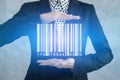 Businesswoman show barcode with glow light on hand