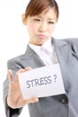 Businesswoman showing a card with word stress?