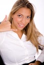 Businesswoman showing telephonic gesture