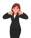 Businesswoman showing thumbs down gesture/sign. Dislike, disapprove, rejection, disagree concept . Royalty Free Stock Photo