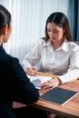 Businesswoman signing contract document with pen. Enthusiastic. Royalty Free Stock Photo