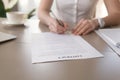 Businesswoman signing document, female hands putting signature, Royalty Free Stock Photo