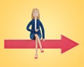 The businesswoman sits on the arrow and shows the right direction. Royalty Free Stock Photo