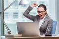 The businesswoman sitting at her desk in business concept Royalty Free Stock Photo