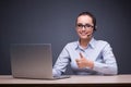 The businesswoman sitting at her desk in business concept Royalty Free Stock Photo