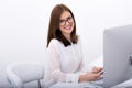 Businesswoman sitting at her workplace in office Royalty Free Stock Photo