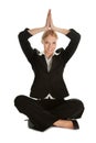 Businesswoman sitting in lotus flower position Royalty Free Stock Photo