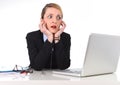 Businesswoman sitting at office desk working with laptop in stress looking upset Royalty Free Stock Photo