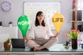 Woman`s Hand Holding Life And Work Text Balloon Royalty Free Stock Photo