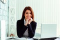 Businesswoman sitting at the table on her workplace Royalty Free Stock Photo