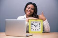 Businesswoman sitting at the table with laptop Royalty Free Stock Photo