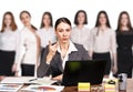 Businesswoman sitting at the table and thinking Royalty Free Stock Photo