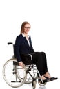 Businesswoman sitting in a wheel chair Royalty Free Stock Photo