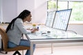 Businesswoman Sitting In Wrong Posture Working On Computer Royalty Free Stock Photo