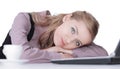 Businesswoman sleeping on the laptop keyboard after work. Royalty Free Stock Photo